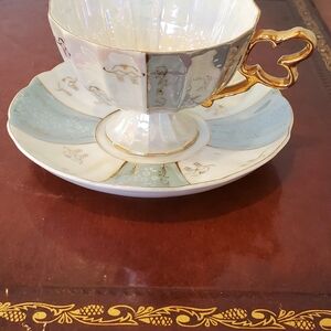 Vintage Japanese lusterware teacup and saucer set imported by UCAGCO